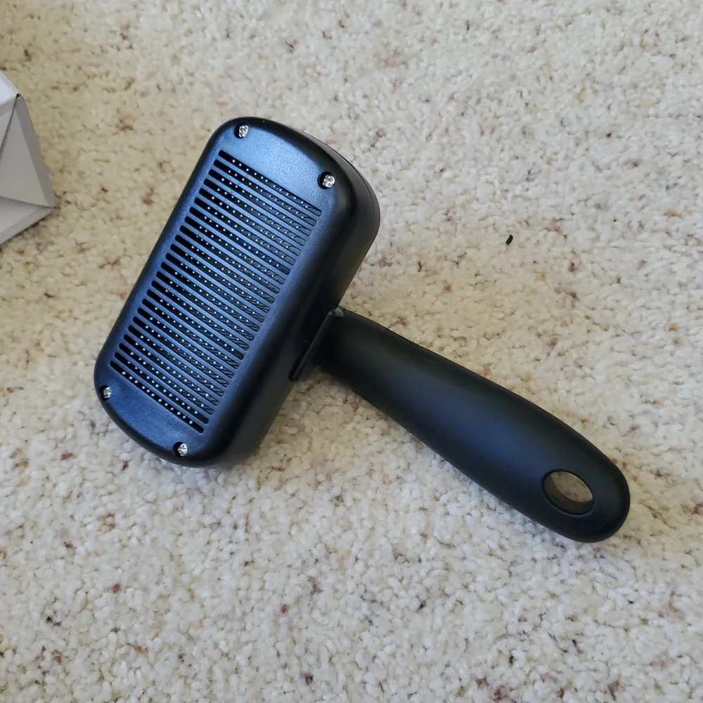 White and Black Dog Grooming Brush